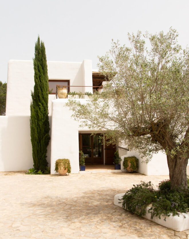 The whitewashed exterior of a villa to rent near Santa Gertrudis, Ibiza