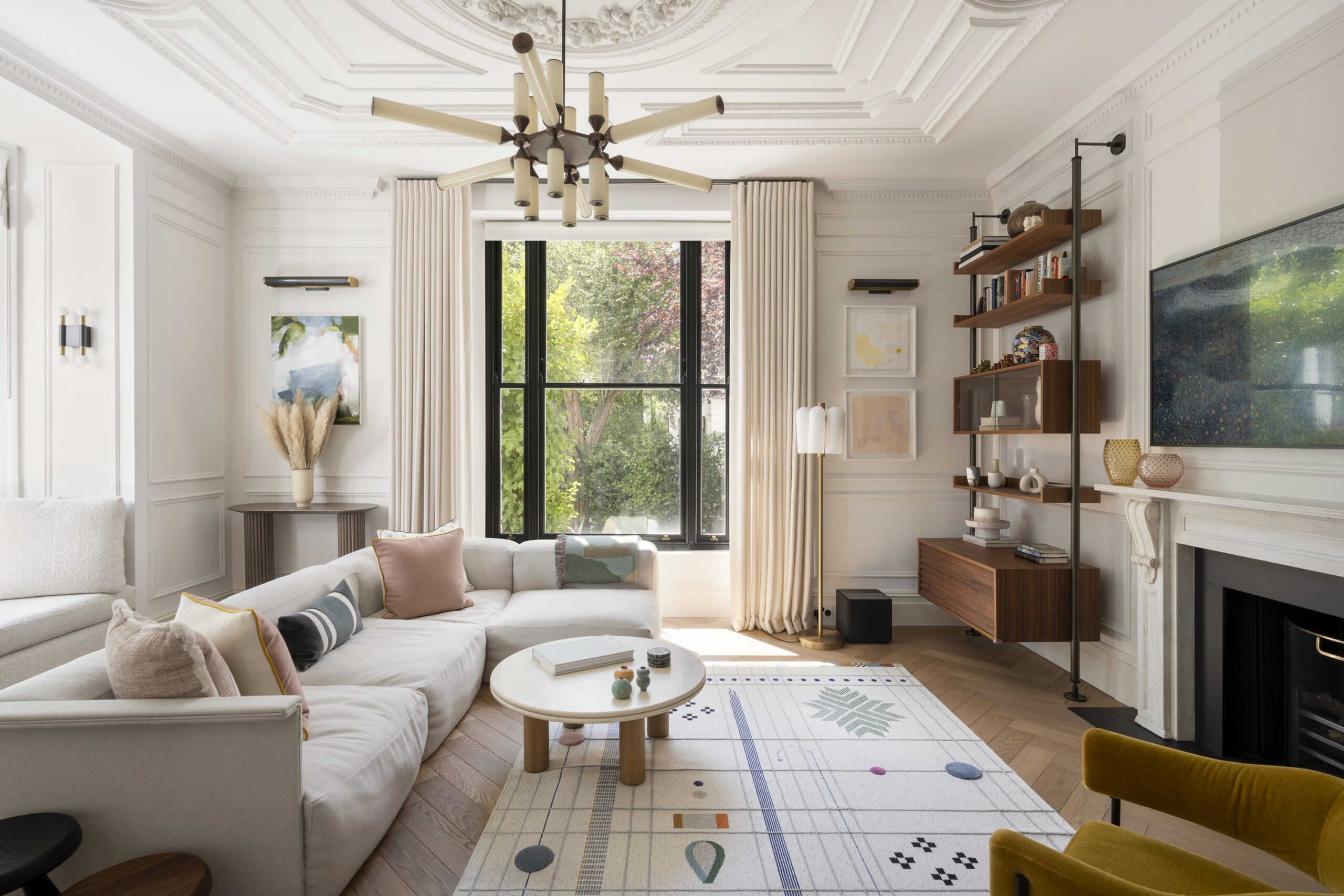 Playfully designed reception room of a luxurious two-bedroom duplex apartment for sale in Notting Hill