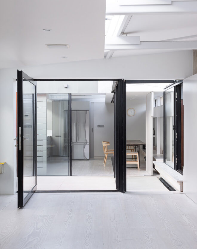 For Rent: Vernon Yard Notting Hill W11 - contemporary architecture with folding glass doors and brick walls