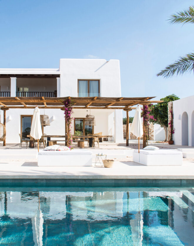 Steps lead into the pool of a villa in Ibiza